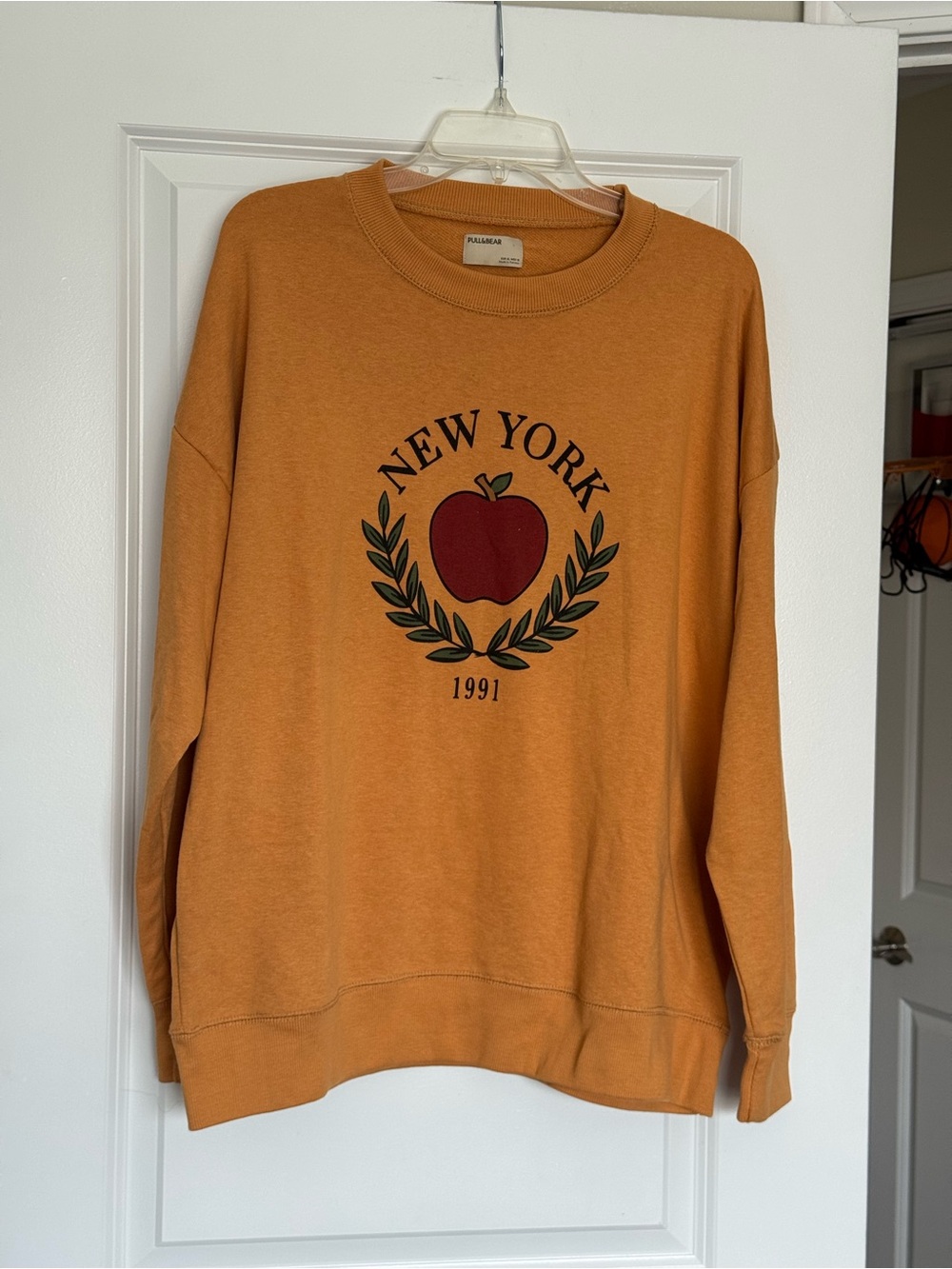 Pull&Bear Mustard Crewneck Sweatshirt with Red Apple Graphic